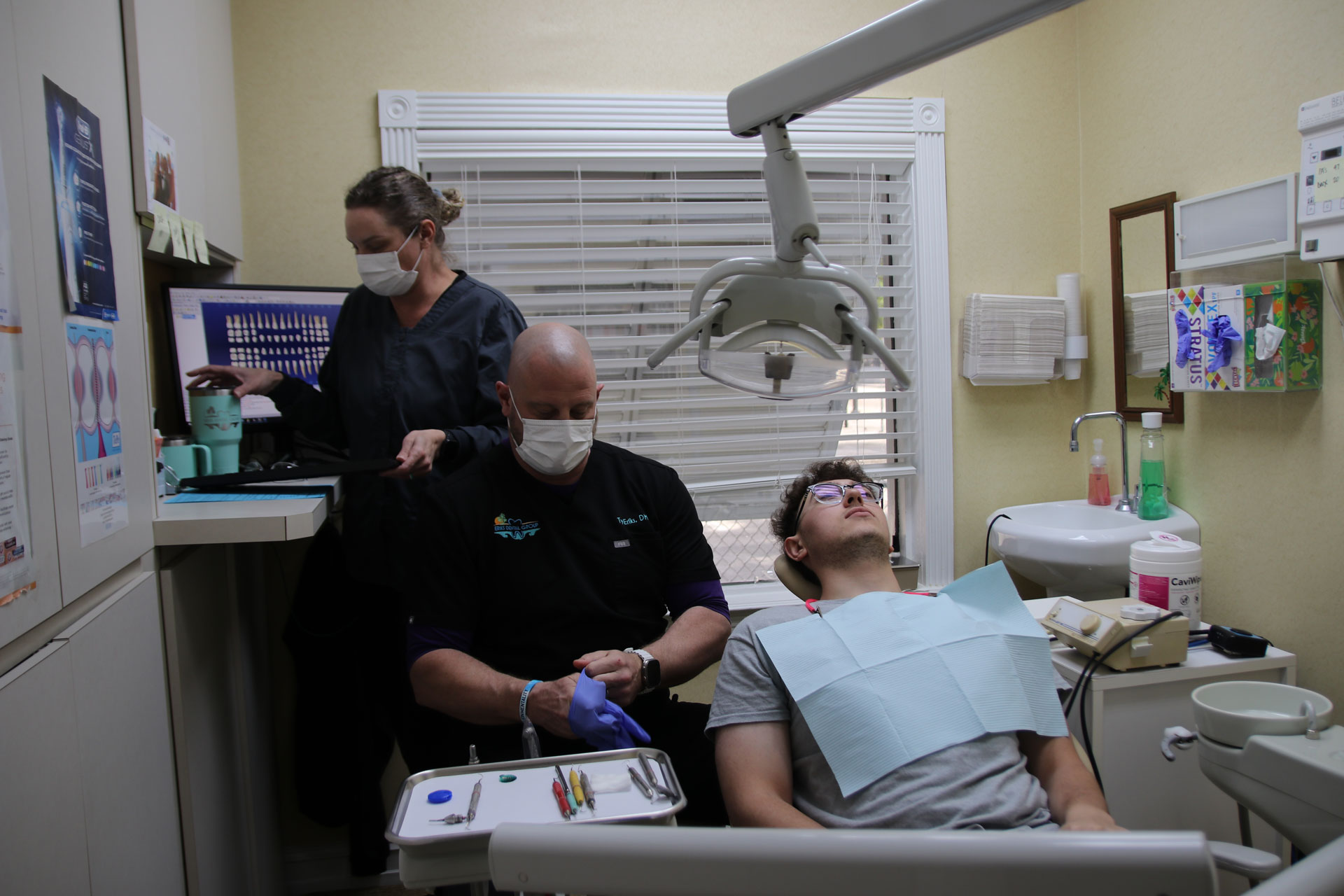 Photo of a patient getting hit teeth worked on.