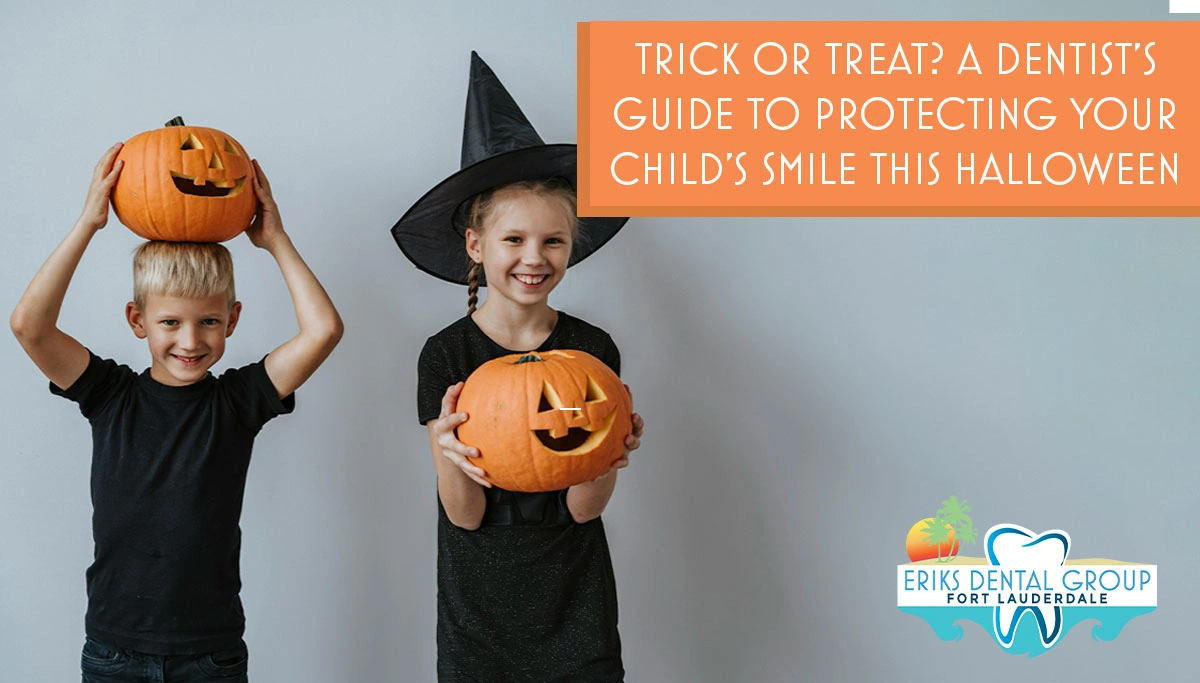 Kids in black shirts and costumes holding pumpkins