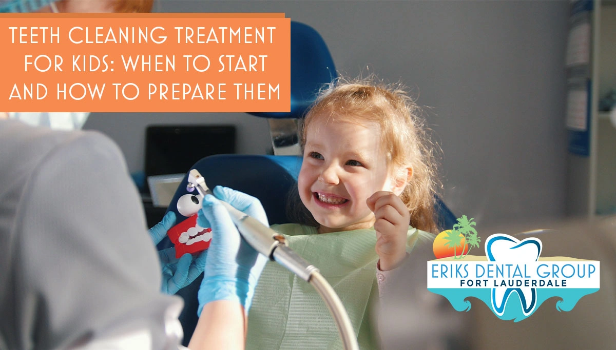child in a dentist chair smiling at dentist
