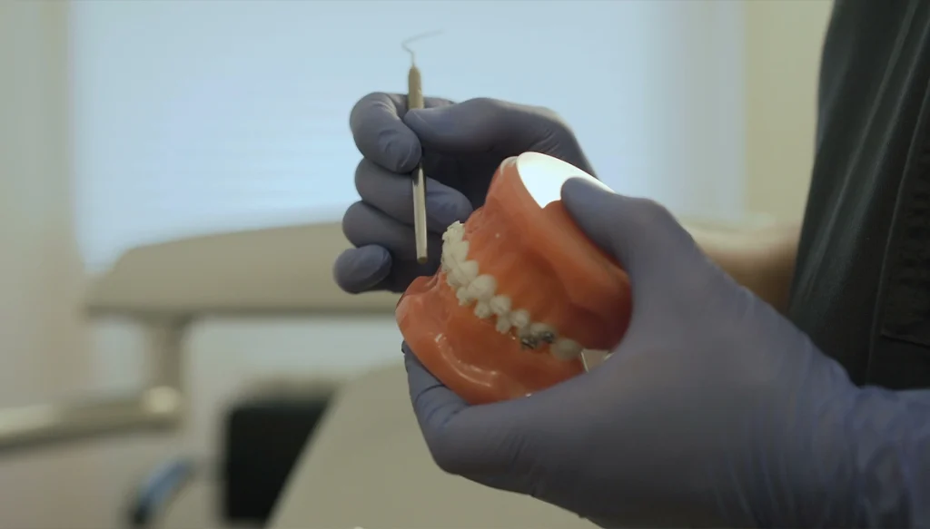 dentist cleaning dentures