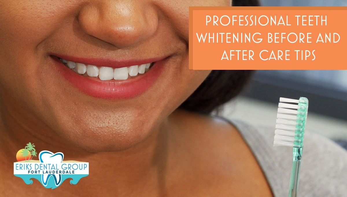 woman smiling while holding a toothbrush